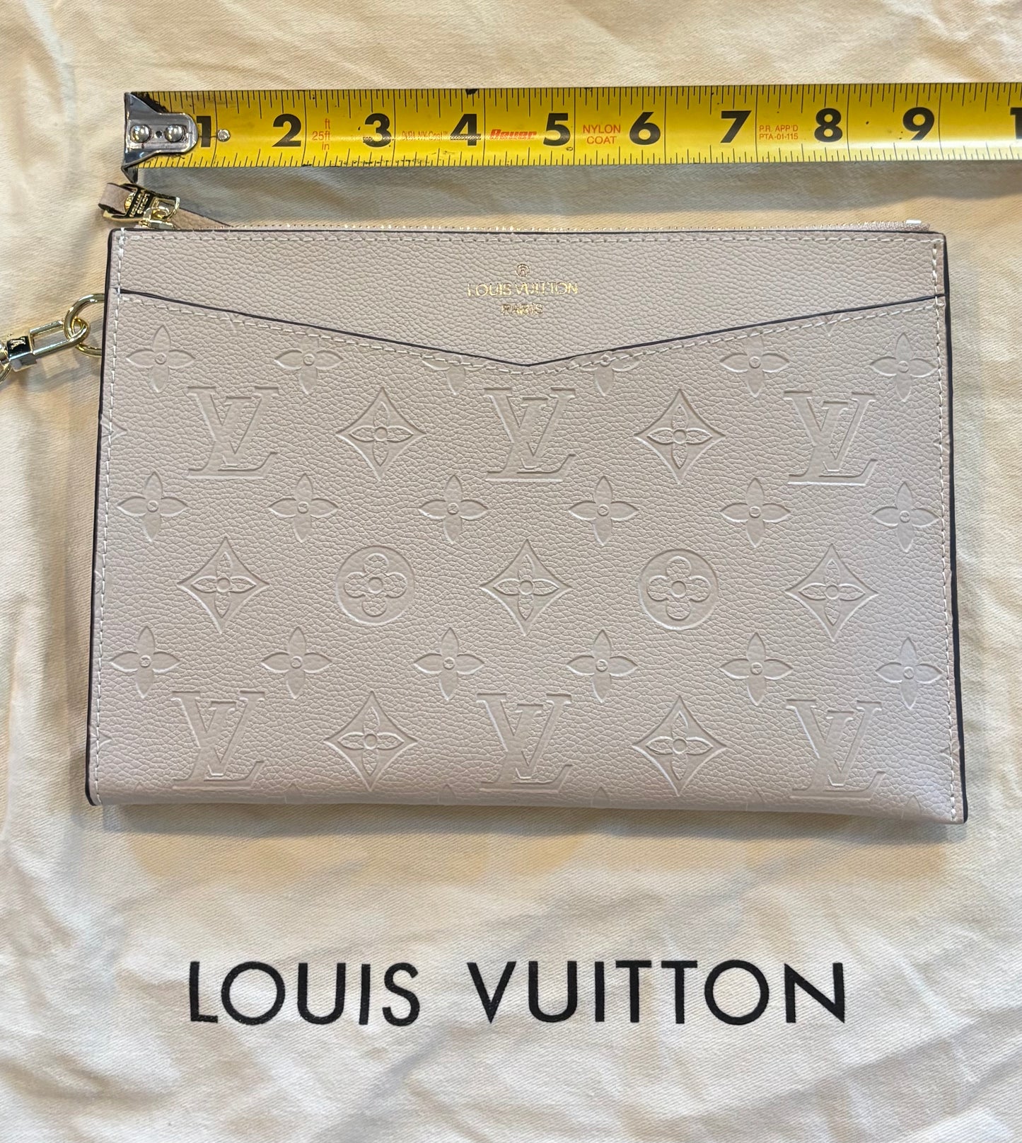 LV Embossed Zippered Clutch