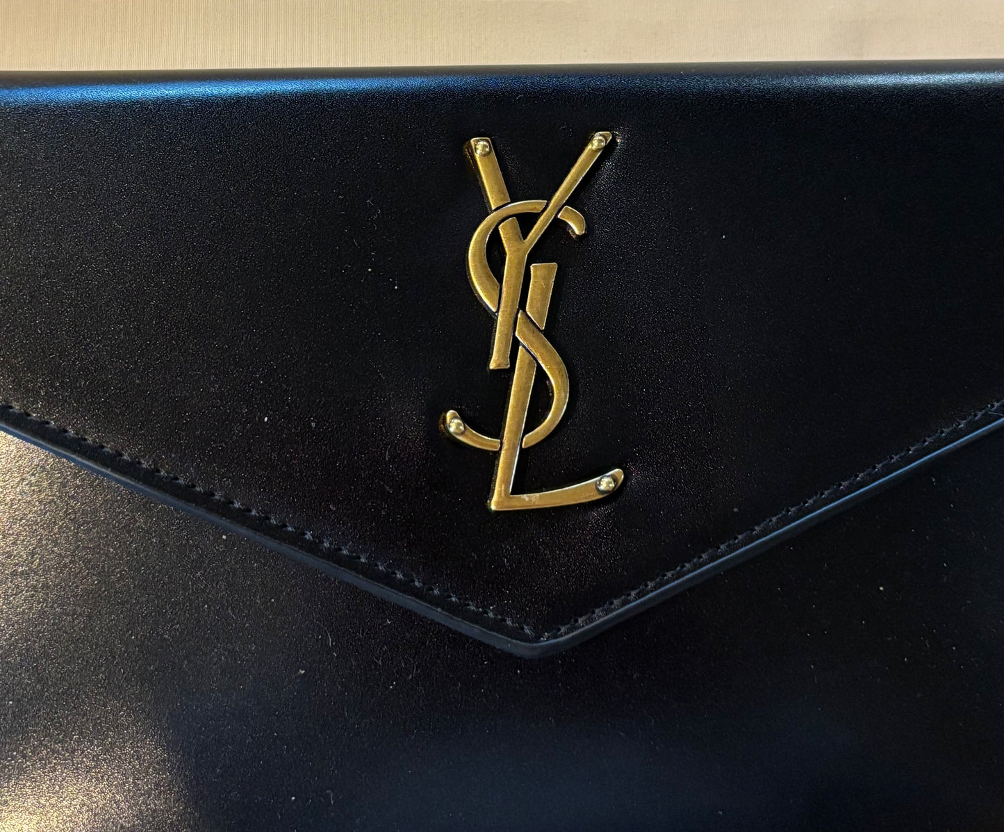 YSL Black clutch rubbed gold hardware